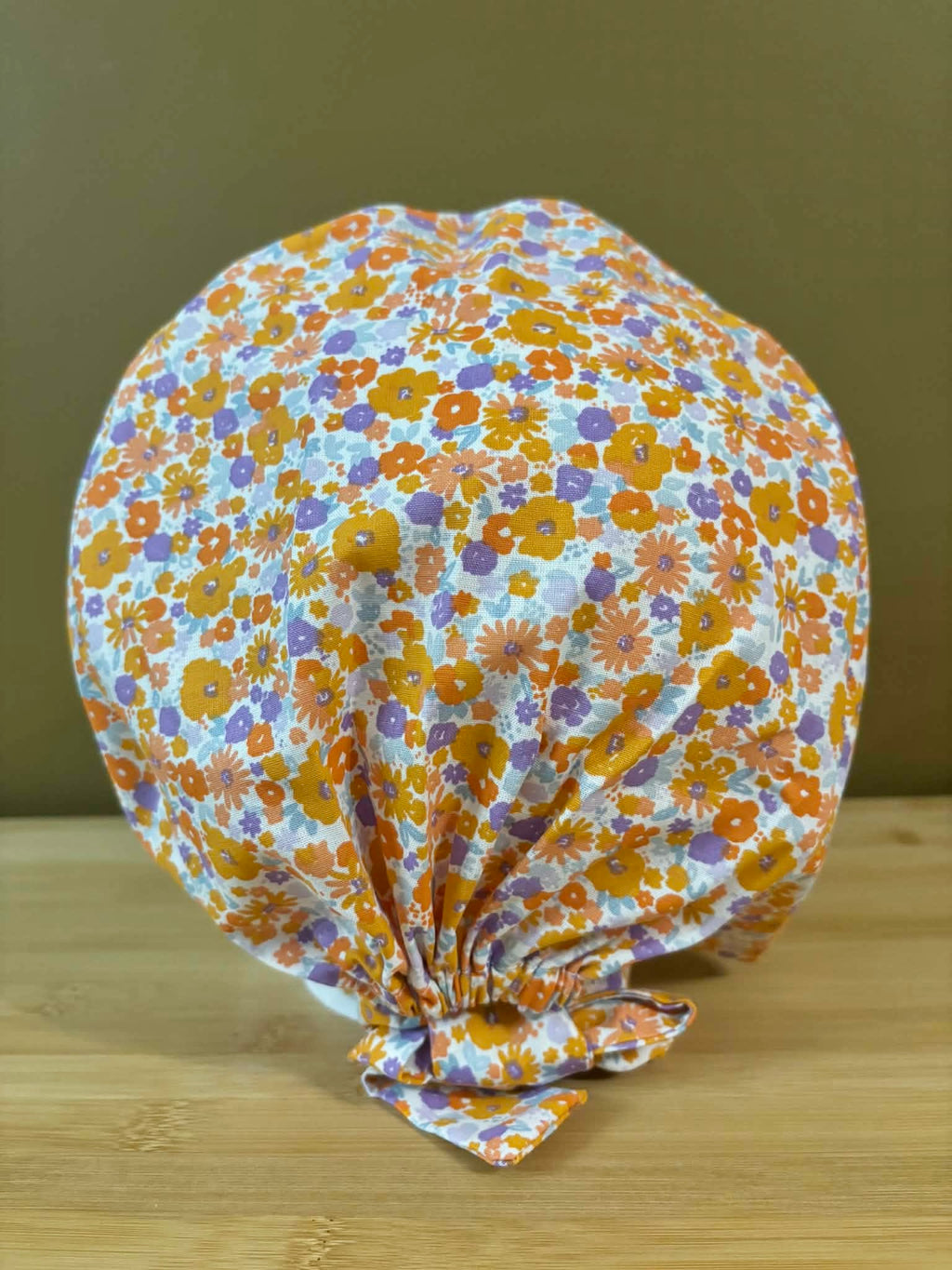 Calot fleurs oranges