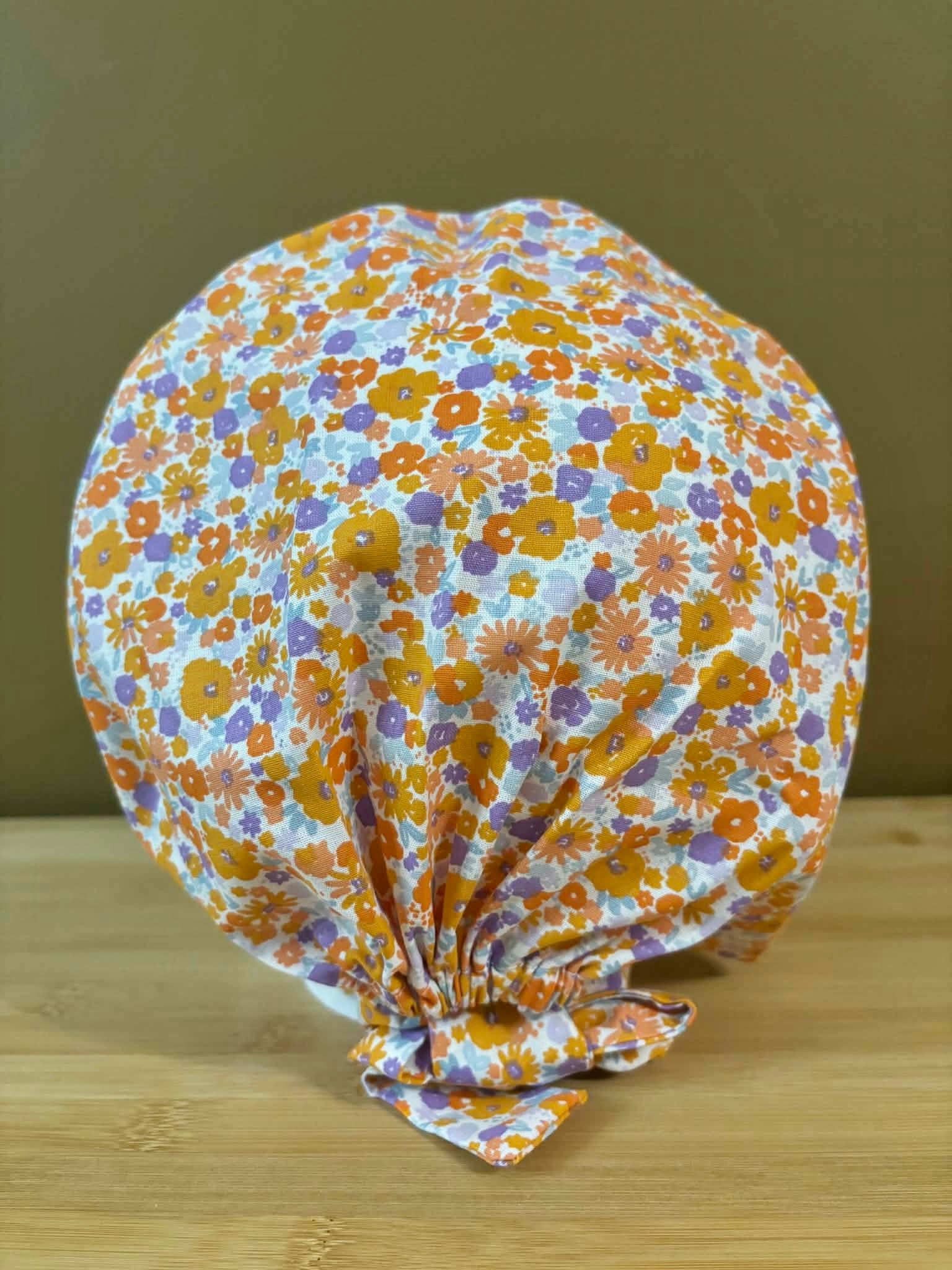 Calot fleurs oranges