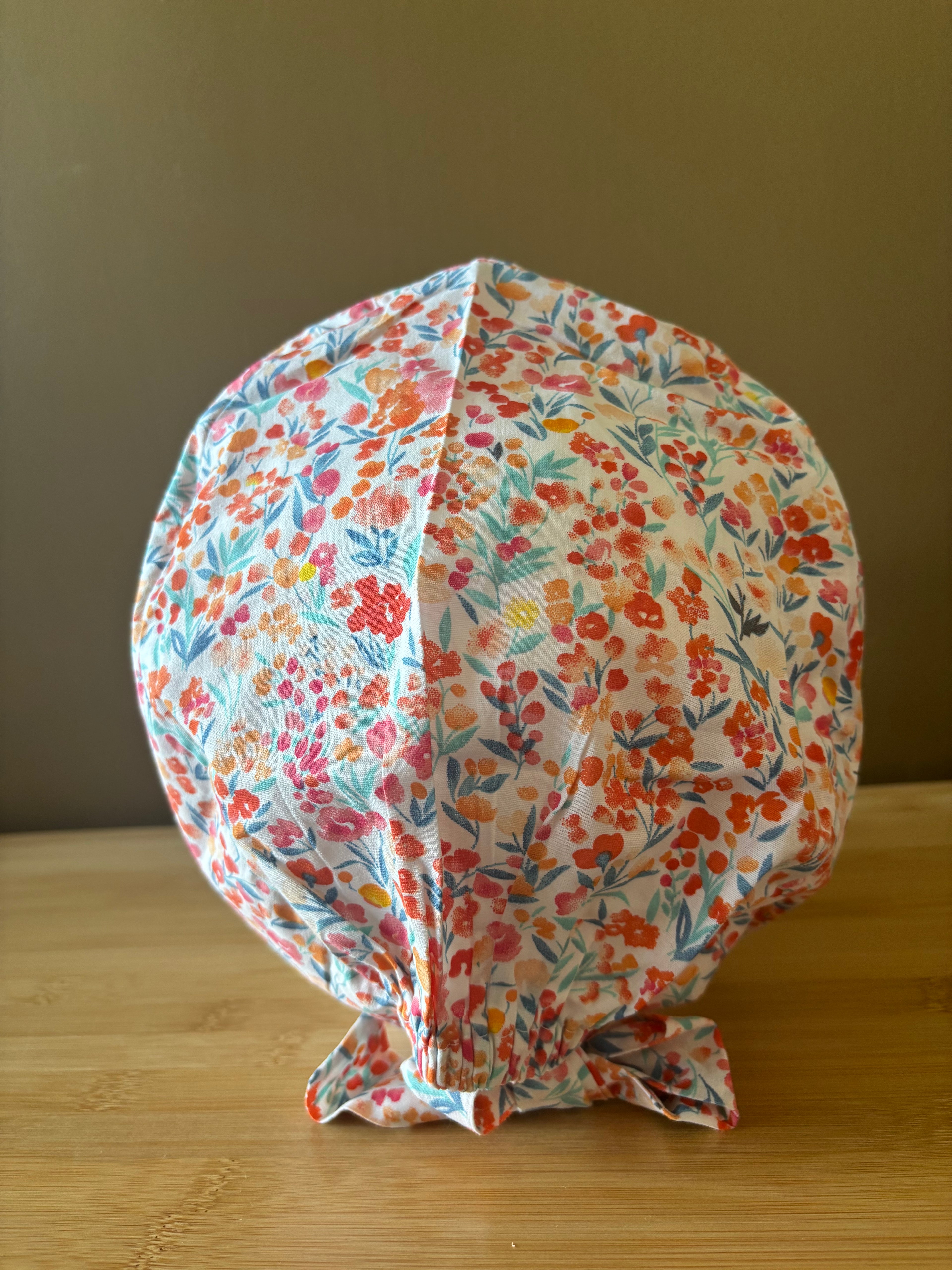 Calot fleurs oranges